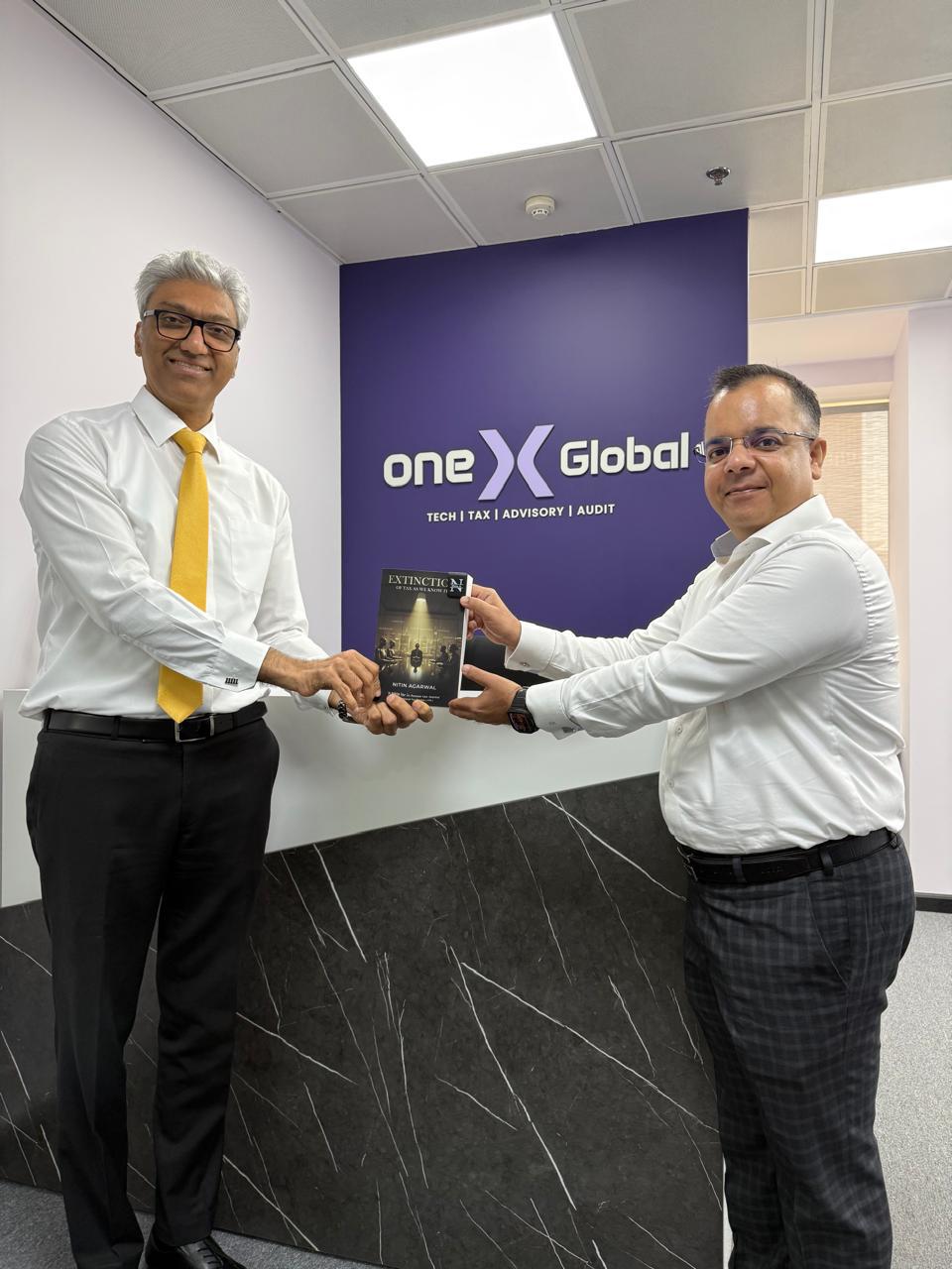 Extinction of Tax presented to Nimish Makvana, President — UAE Taxation Society
